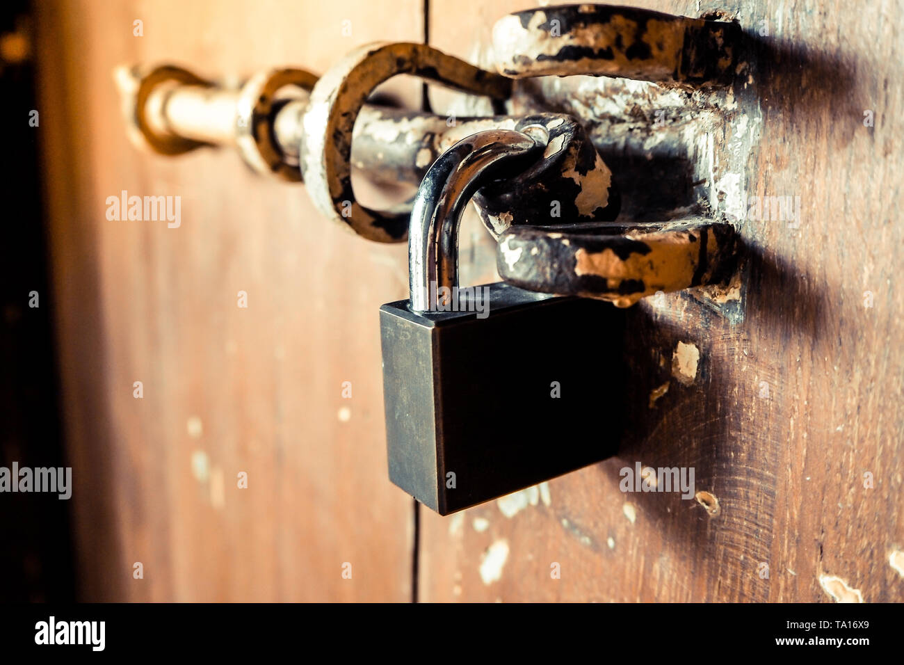 Ancient locked wooden door big hires stock photography and images Alamy