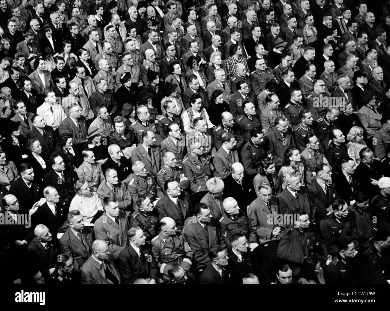 View of the audience at the opening of the 3rd Kriegswinterhilfswerk by Adolf Hitler in the Berlin Sportpalast. Photo: Eisenhart Stock Photo