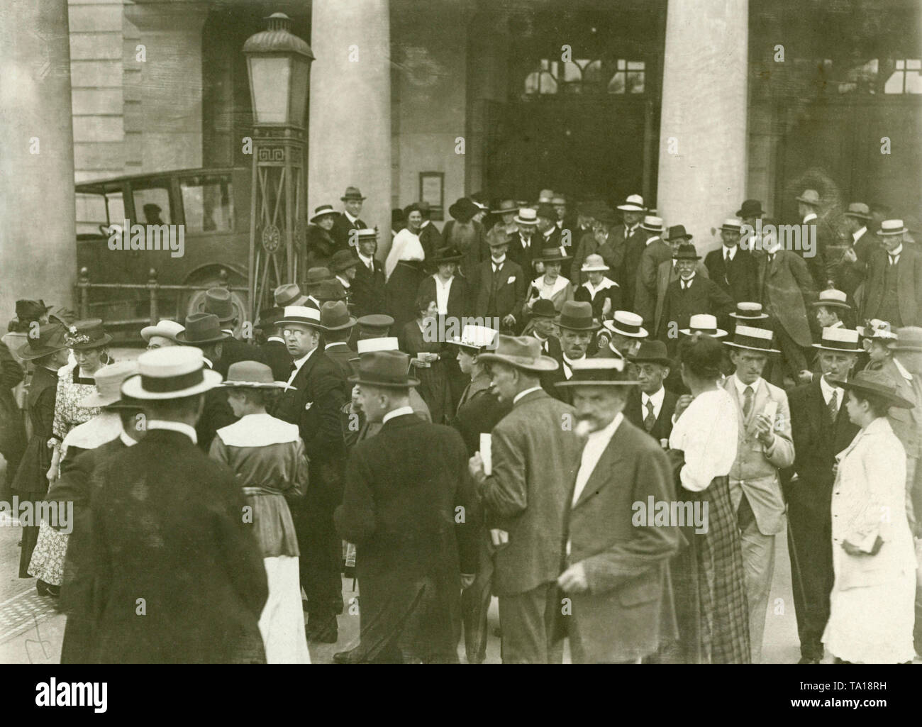 Prime Minister Philipp Heinrich Scheidemann speaks against the adoption of the Treaty of Versailles in a protest meeting in front of the National Assembly. This photograph shows onlookers who wait for the end of the session of the National Assembly. Stock Photo