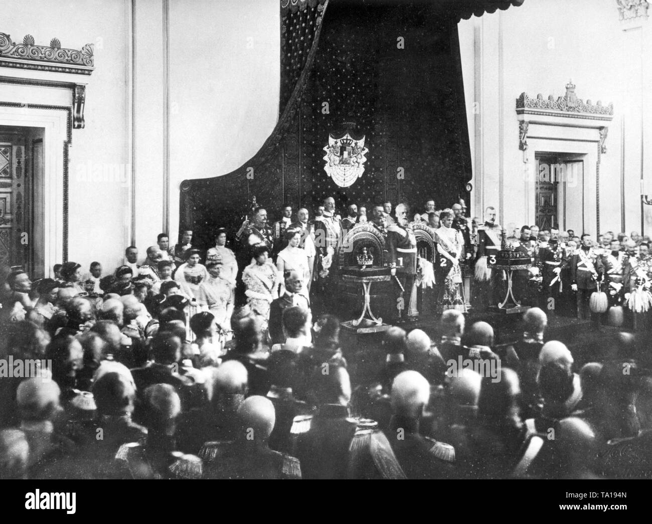 The accession of Ludwig III of Bavaria to the throne. In the photo, the homage in the large throne hall of the Munich Residenz.(1: Ludwig III of Bavaria., 2. Queen Maria Theresa and 3. Rupprecht, Crown Prince of Bavaria). Stock Photo