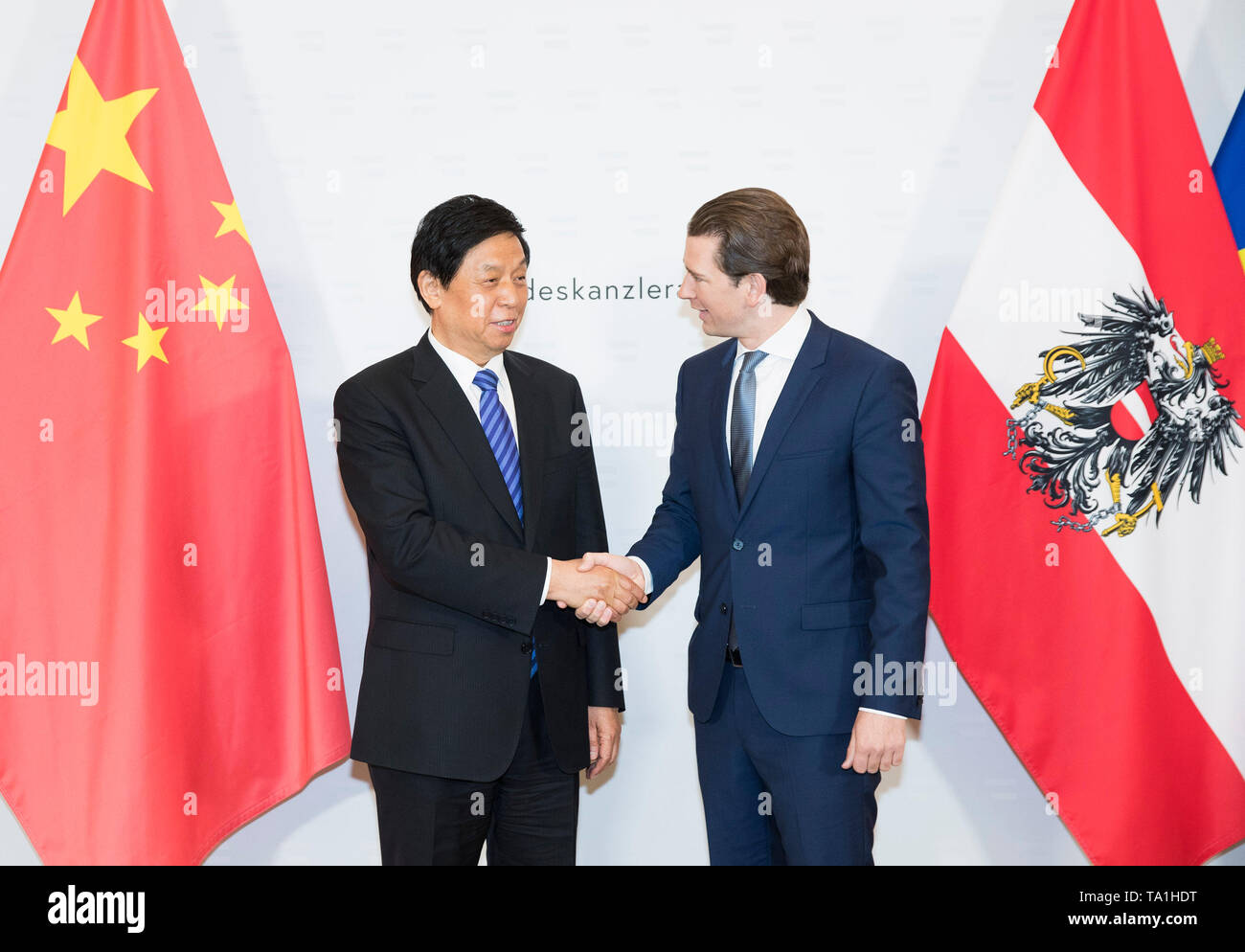 Vienna, Austria. 21st May, 2019. Li Zhanshu (L), chairman of the Standing Committee of the National People's Congress (NPC), meets with Austrian Chancellor Sebastian Kurz in Vienna, Austria, on May 21, 2019. China's top legislator Li Zhanshu paid an official friendly visit from May 18 to 21 to Austria, where he met with Austrian leaders on promoting bilateral ties and expressed China's stance on upholding multilateralism and free trade. Credit: Huang Jingwen/Xinhua/Alamy Live News Stock Photo
