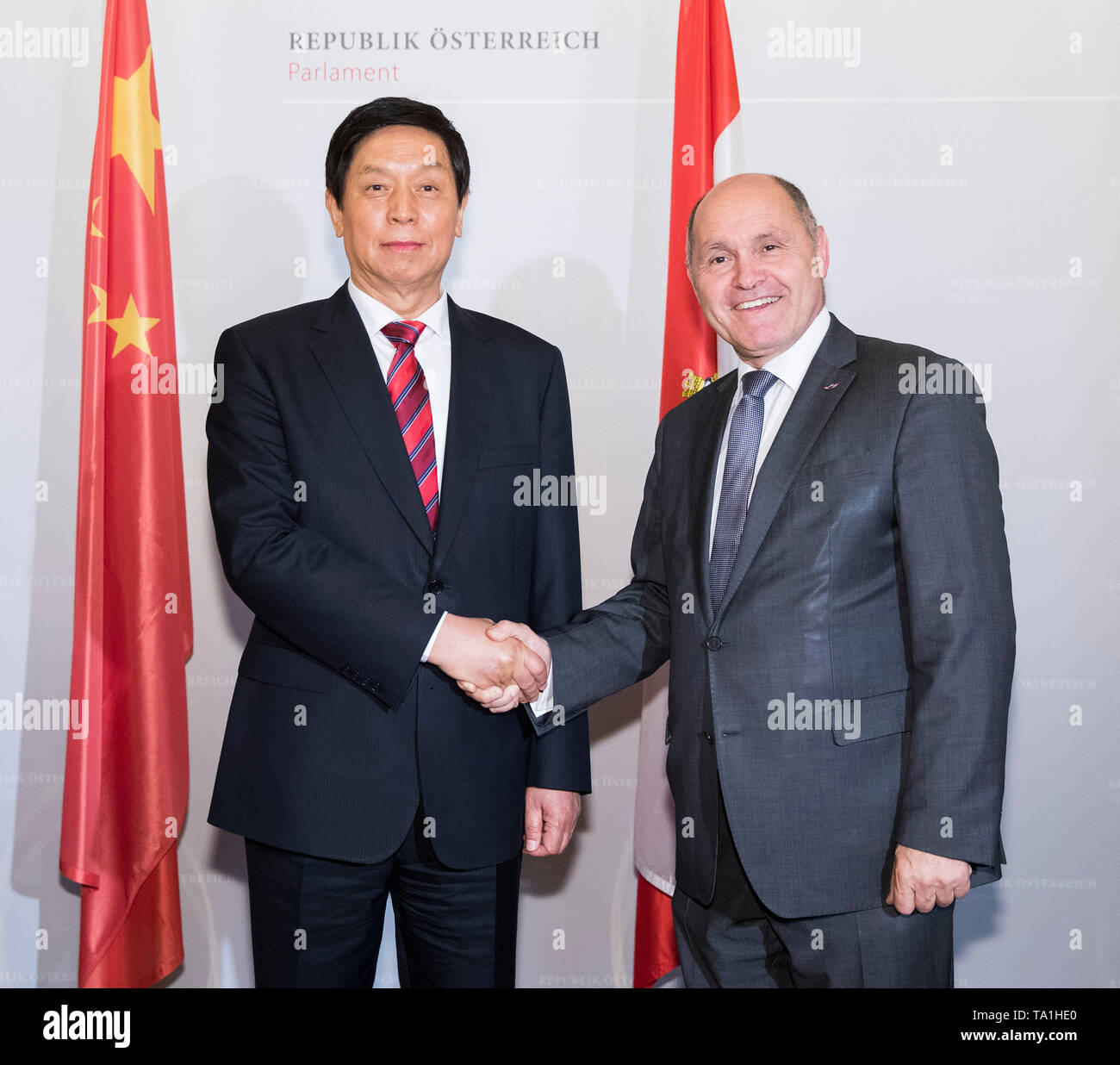 Vienna, Austria. 20th May, 2019. Li Zhanshu (L), chairman of the Standing Committee of the National People's Congress (NPC), meets with Austrian National Council President Wolfgang Sobotka in Vienna, Austria, on May 20, 2019. China's top legislator Li Zhanshu paid an official friendly visit from May 18 to 21 to Austria, where he met with Austrian leaders on promoting bilateral ties and expressed China's stance on upholding multilateralism and free trade. Credit: Huang Jingwen/Xinhua/Alamy Live News Stock Photo
