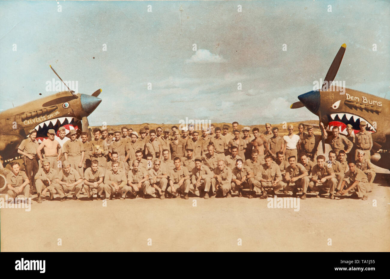 (190521) -- NEW YORK, May 21, 2019 (Xinhua) -- Members of the 76th Squadron of the 23rd Fighter Group of the 14th U.S. Air Force, in which Flying Tiger pilot Glen Beneda served as a pilot, pose for photos in front of two shark-teeth fighter planes in China during the World War II. The sacrifices Chinese and Americans made side by side in the war are our common heritage which should be cherished by our two countries, said Edward Beneda, vice chairman of the Sino-American Aviation Heritage Foundation (SAAHF) and son of U.S. Flying Tigers pilot Glen Beneda, 'We disagree from time to time, but the Stock Photo