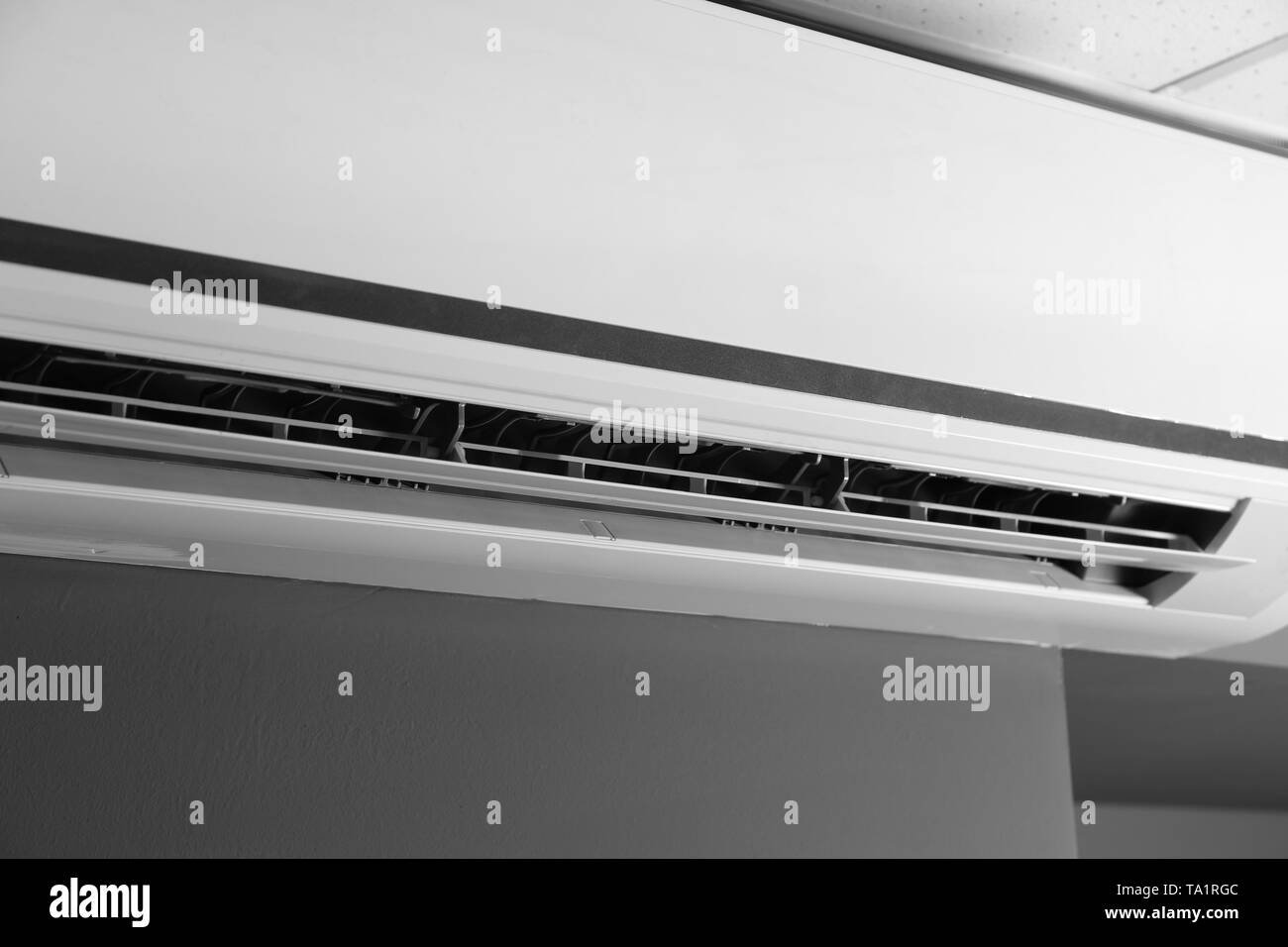 Wall mounted air conditioner Black and White Stock Photos & Images - Alamy