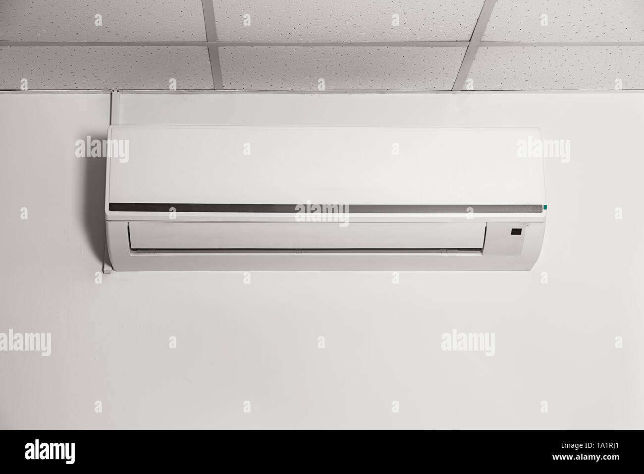 Modern air conditioner on wall Stock Photo - Alamy
