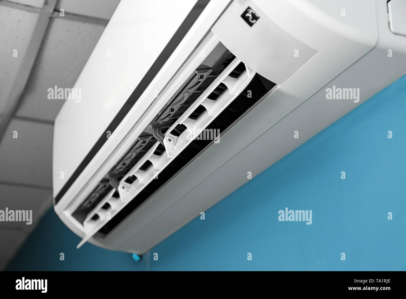 Modern air conditioner on wall, closeup Stock Photo - Alamy