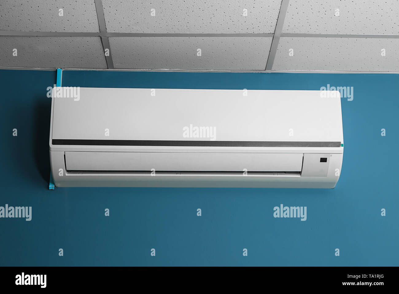 Modern air conditioner on wall Stock Photo - Alamy