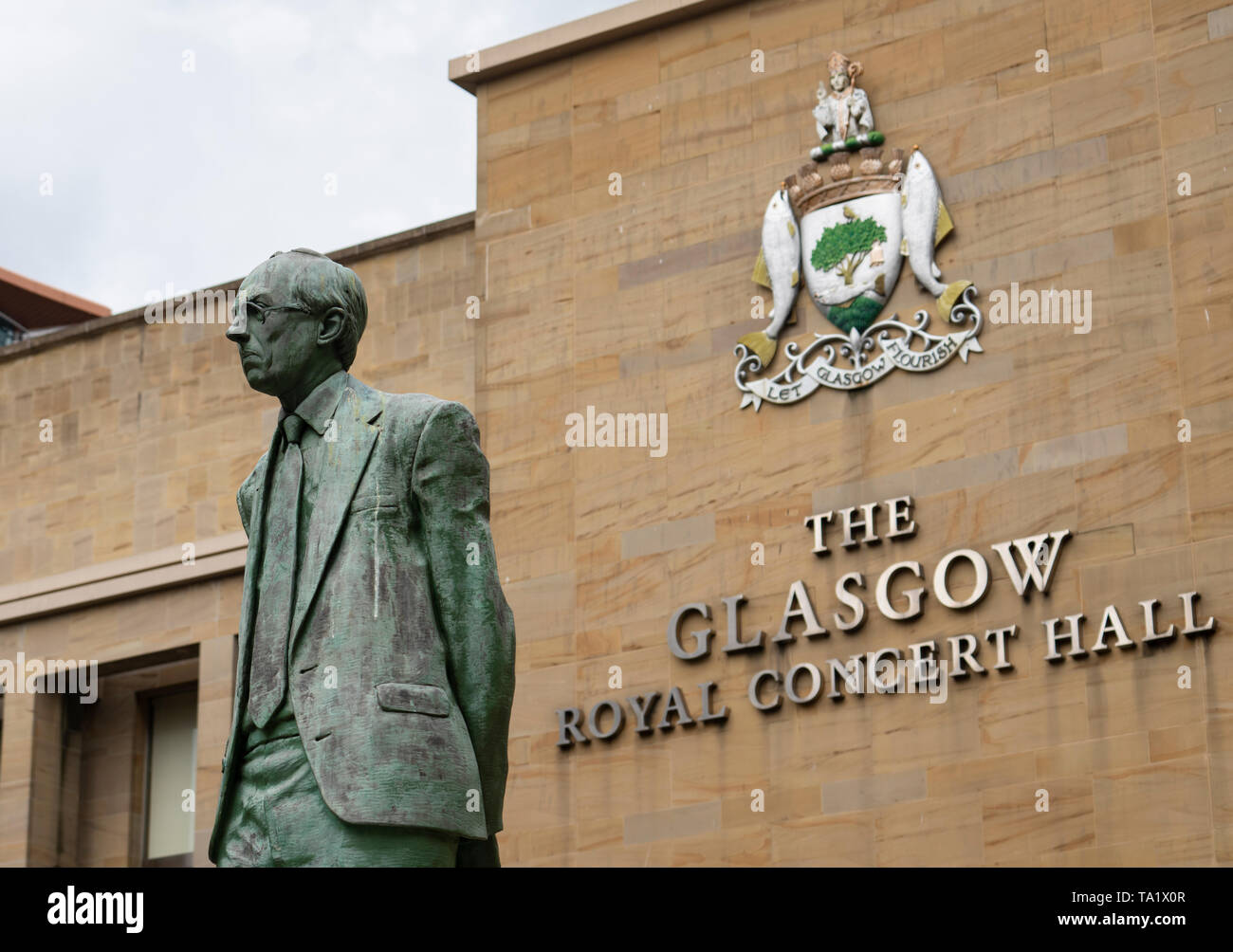 View of statue of Donald Dewar on Buchanan Street the main pedestrian shopping street in Glasgow, Scotland, UK Stock Photo