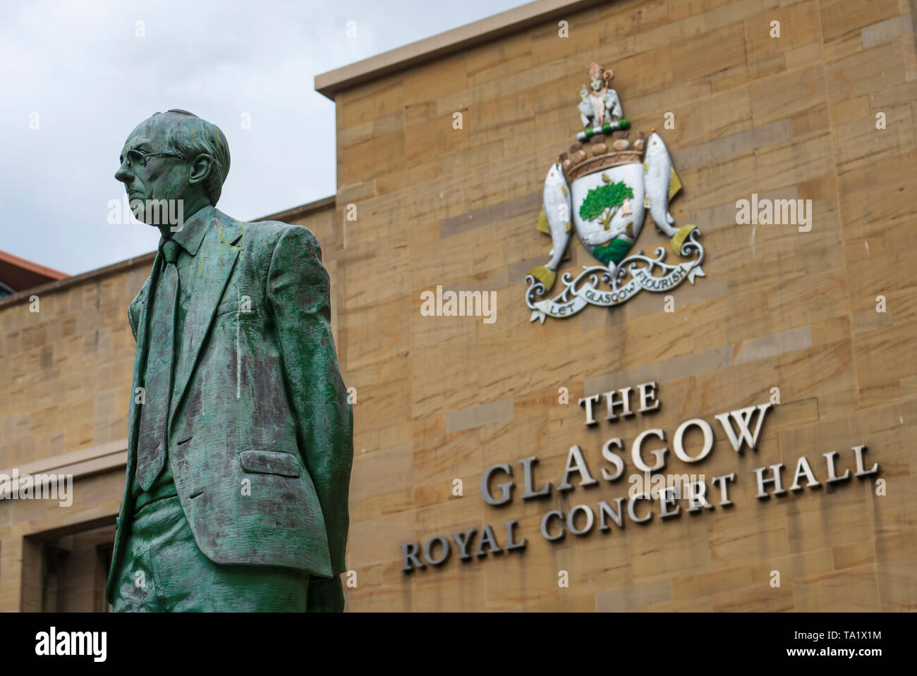 View of statue of Donald Dewar on Buchanan Street the main pedestrian shopping street in Glasgow, Scotland, UK Stock Photo