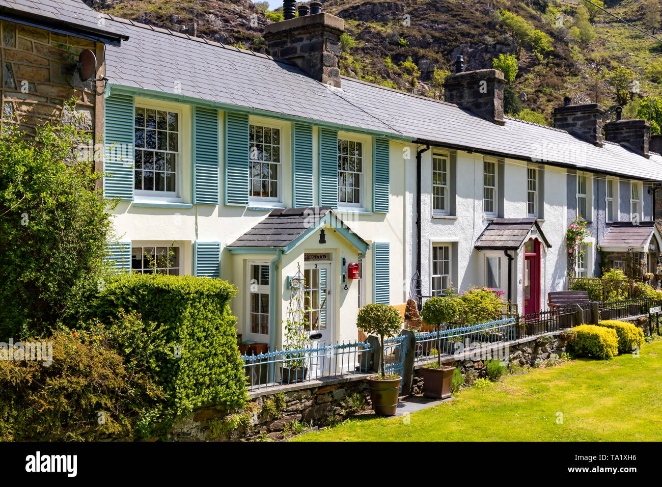 Beddgelert Gwnedd Wales May 13, 2019 Attractive row of old cottages in Beddgelert, in the Snowdonia National Park Stock Photo