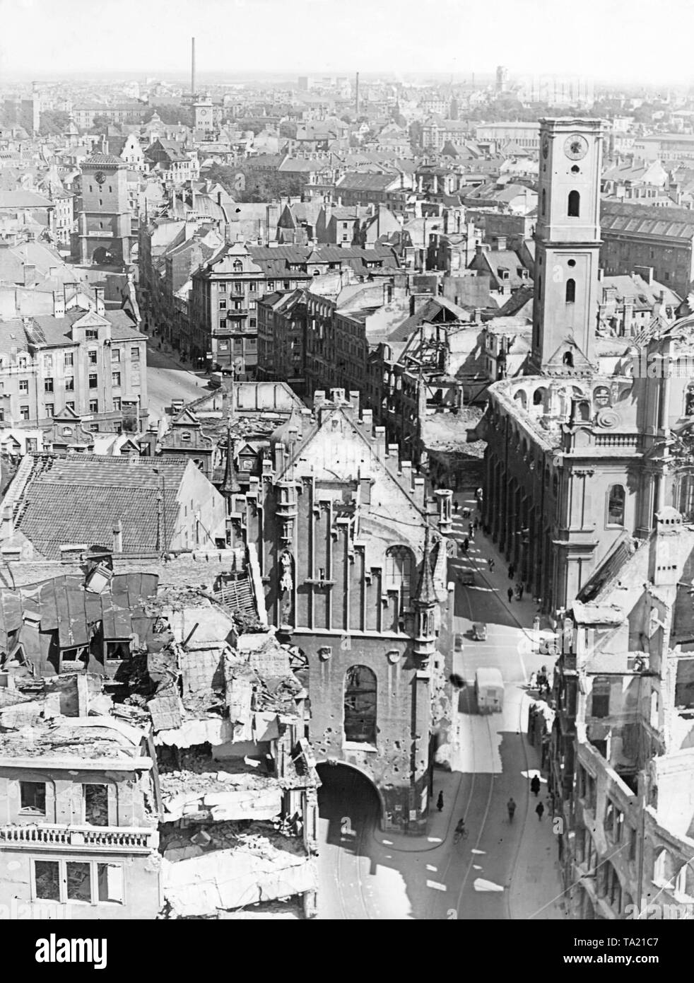 View of the damaged Old Town Hall and Heiliggeistkirche after the allied bombing in Munich, Germany, 1945 Stock Photo