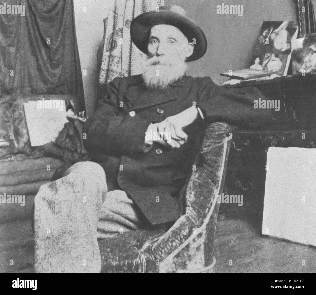 The photo shows the French impressionist Pierre Auguste Renoir (1841-1914) at the turn of the century in his studio in Fontainebleau. Stock Photo
