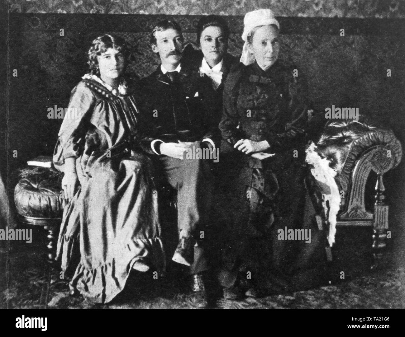 The Scottish author Robert Louis Stevenson during a visit to Sydney, Australia with his step-daughter, Mrs. Strong, his wife Fanny Stevenson and his mother (from left). Stock Photo