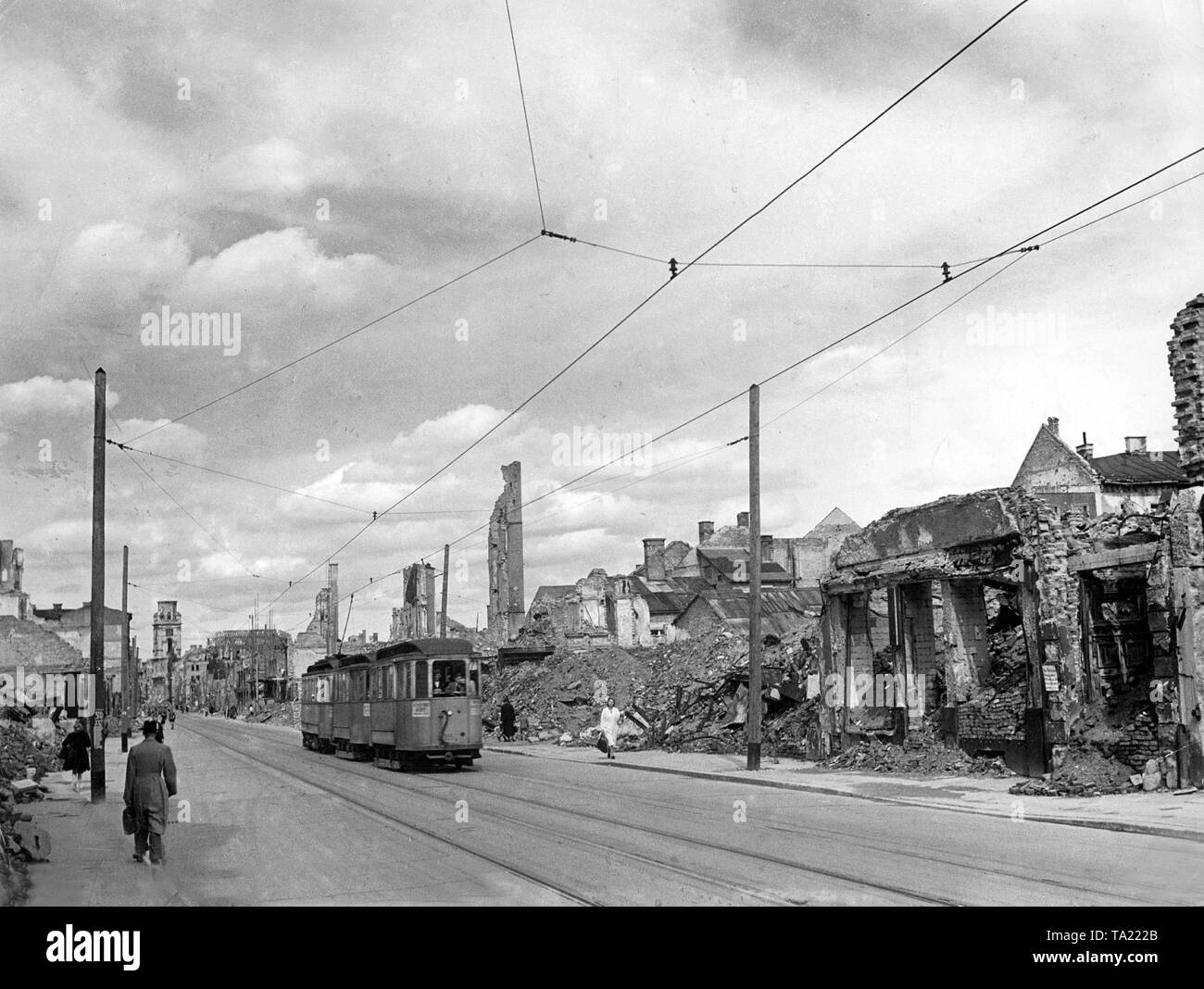 A tram runs through the Auguststrasse in Munich in the summer of 1945. Stock Photo