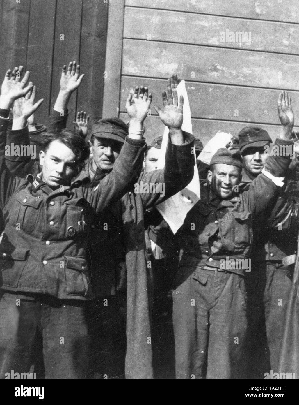 German Wehrmacht soldiers surrender at the Prague Castle on May 8. 1945. Stock Photo