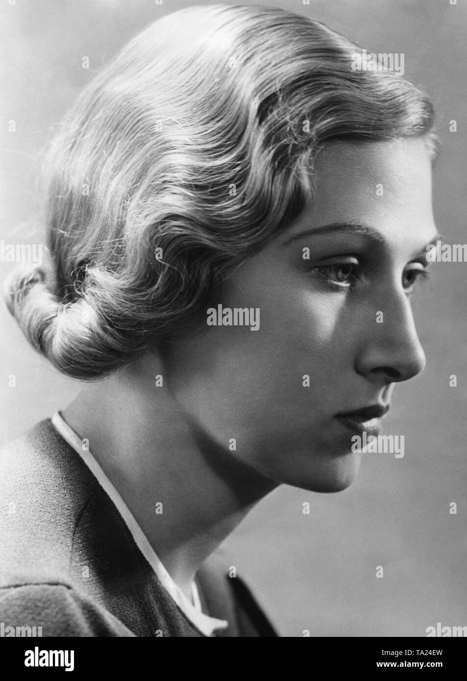 Woman portrait with contemporary hair fashion. Undated photo. Stock Photo