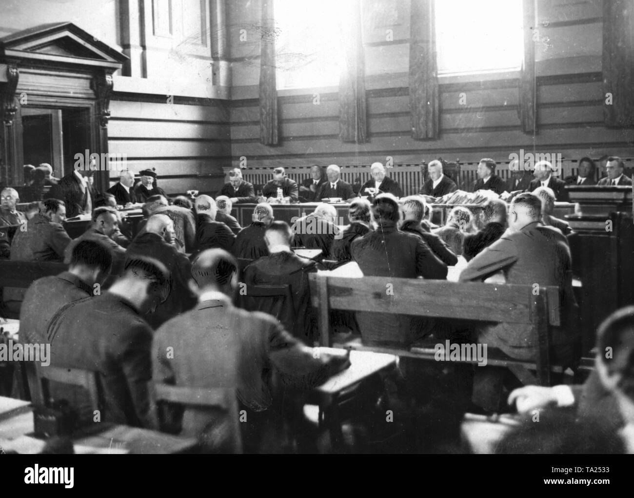 In the courtroom of the district court of Altona, takes place the trial of peasant bombers, who were accused of having prepared and carried out bombings as a protest against offices and authorities in Neumuenster and Oldeslohe. Stock Photo