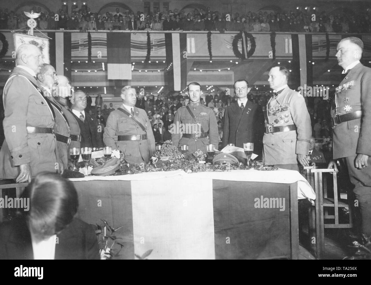 Prominent German ocean fliers and transatlantic aviators are honored by the leadership of the Stahlhelm at an event with 11,000 participants in Berlin's Sportpalast. Rear row from left to right: Captain Hermann Koehl (in civilian), Stahlhelm leader Franz Seldte, Major James C. Fitzmaurice, Ehrenfried Guenther Freiherr von Huenefeld, and the Stahlhelm Major von Stephani. Stock Photo