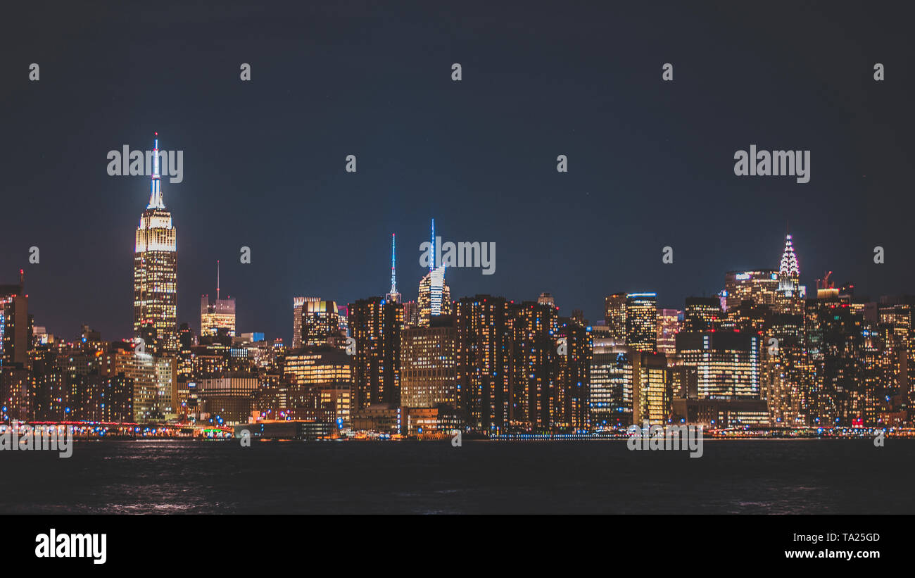 New York City, New York, USA. Day and night skylines from Brooklyn plus NYPD police car in Times Square. Stock Photo