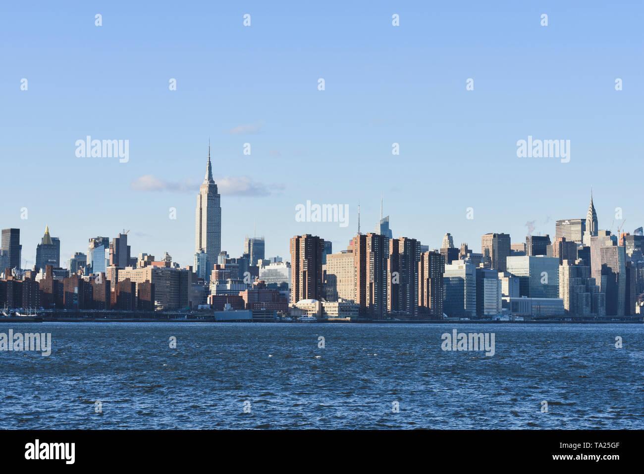 New York City, New York, USA. Day and night skylines from Brooklyn plus NYPD police car in Times Square. Stock Photo