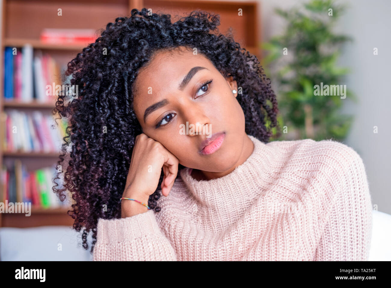 Portrait of troubled black girl with negative feelings Stock Photo