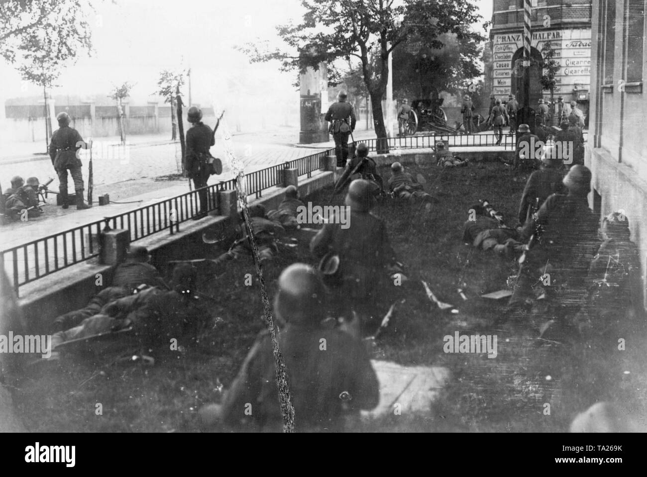 In August 1919 the so-called Black Reichswehr, an association of several Freikorps units, defeated the first Polish uprising in Upper Silesia. Here Freikorp units fight around the station in Myslowitz. Stock Photo