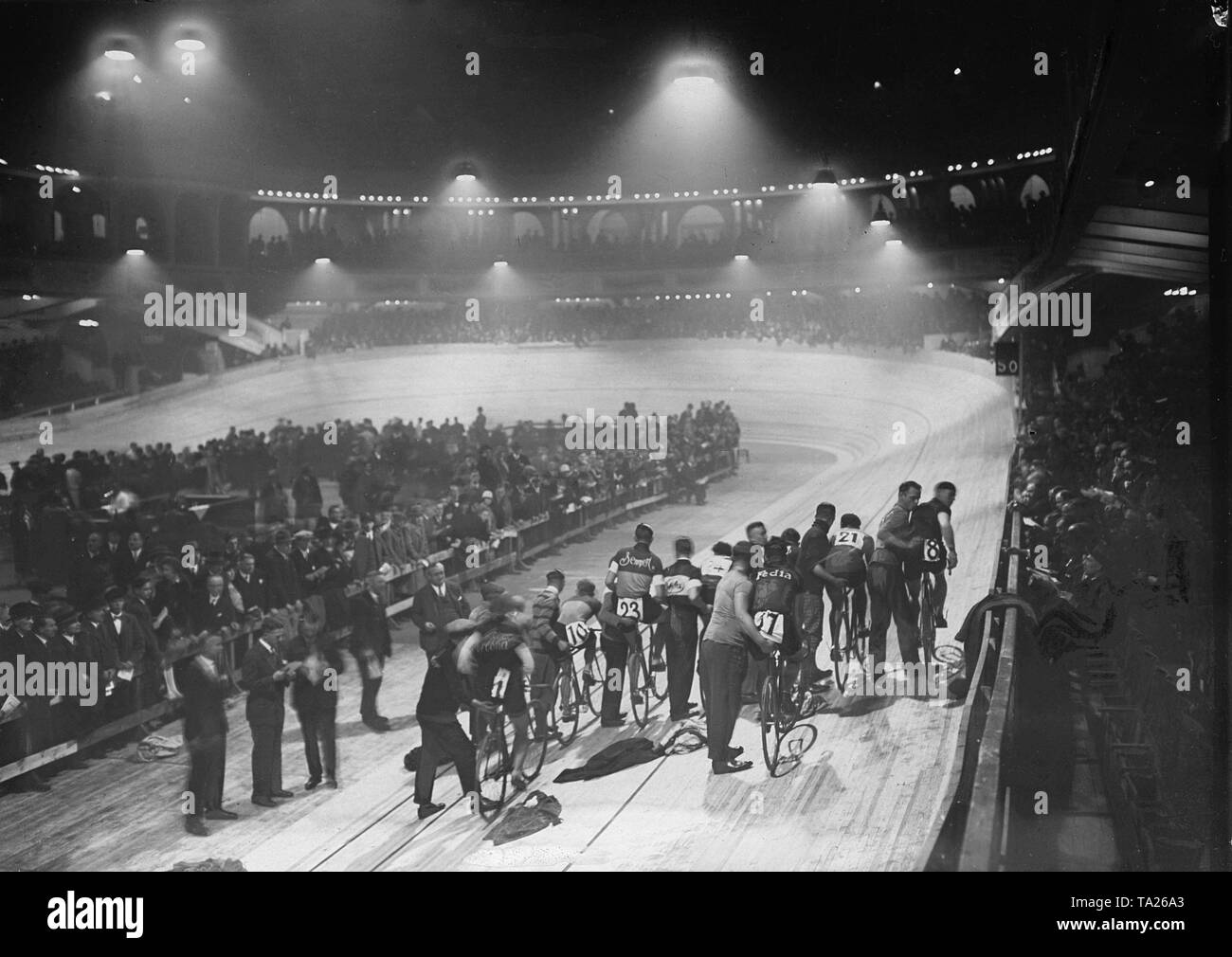 Several track cyclists are preparing for the start of the opening race of the Olympiabahn in Berlin. Stock Photo