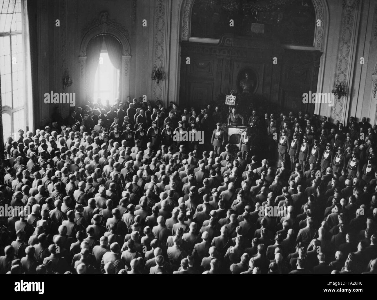 In the crowded hall of the Reich Ministry of Labor, Minister of Labour and leader of the Stahlhelm, Franz Seldte, is holding a speech. Stock Photo