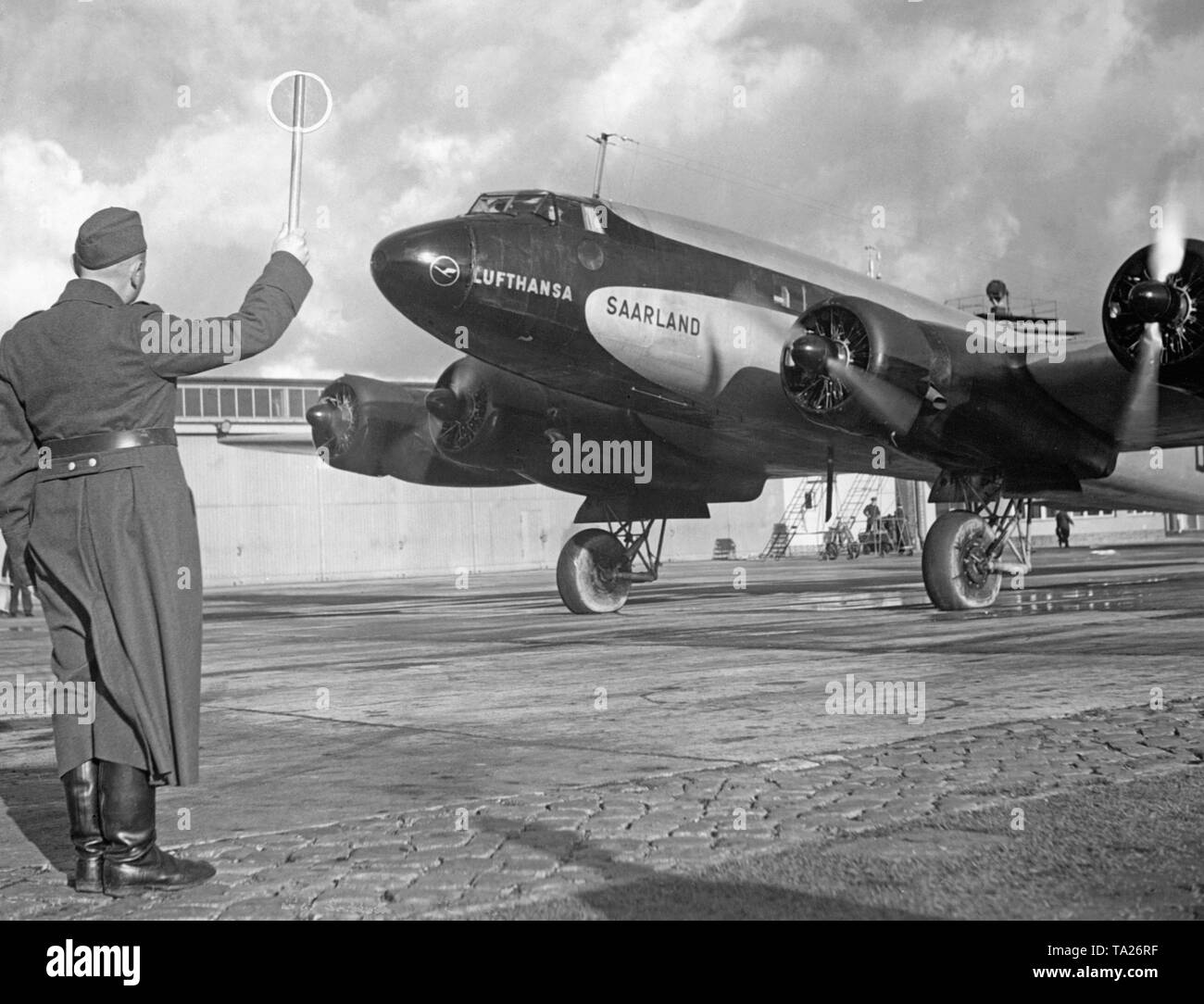 A Focke-Wulf Condor of Deutsche Lufthansa at the Berlin-Rangsdorf Airport. The 'Condor' with the baptismal name 'Saarland' bore the tail number D-ADHR. Stock Photo