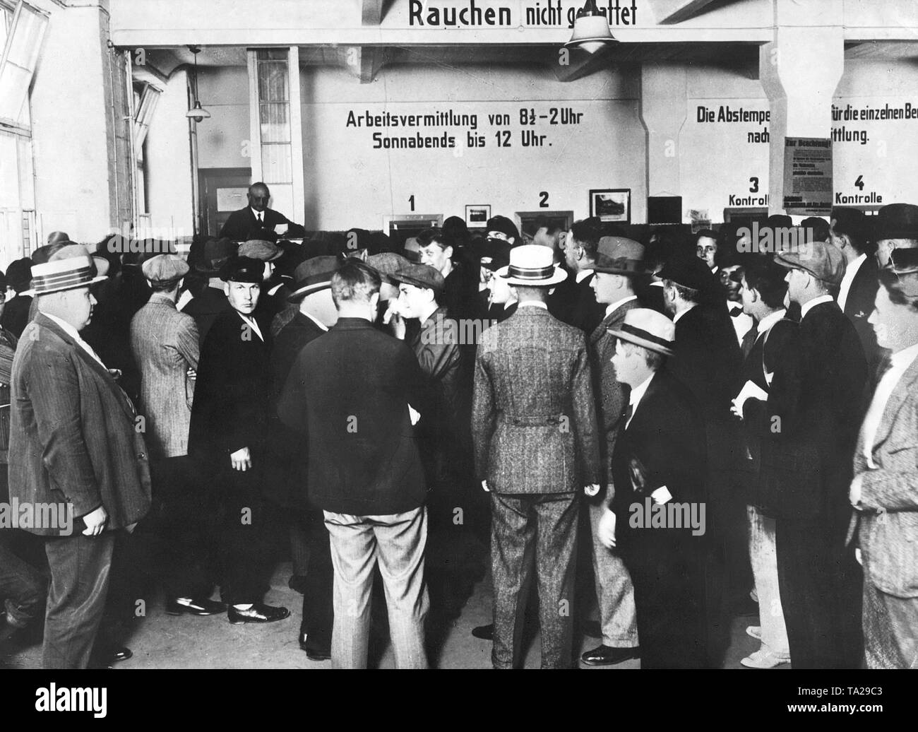 Queues of unemployed people in an employment office. Stock Photo