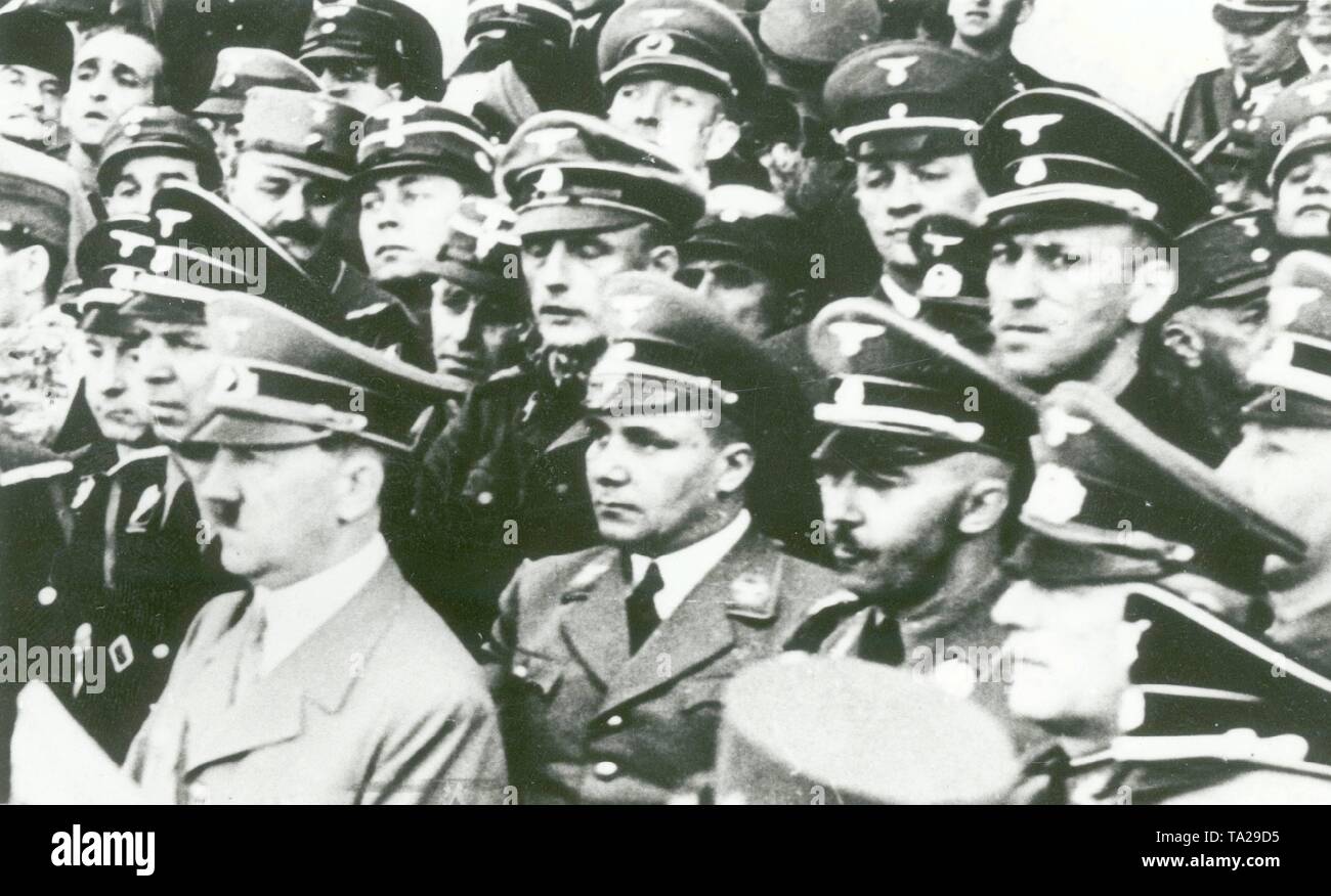 Adolf Hitler at the Hofburg Palace in Vienna after the "Anschluss" of Austria. Left of Hitler his adjutant Julius Schaub, right behind him, Martin Bormann, right beside Heinrich Himmler and behind Ernst Kaltenbrunner. Stock Photo