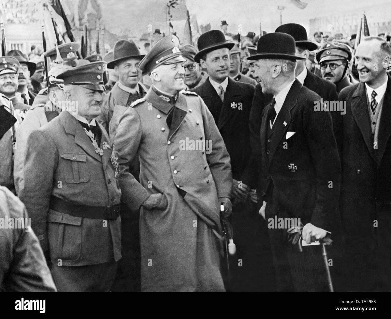 The image shows Chancellor Franz von Papen (right), who had to resign on 17 November 1932 and his successor General Kurt von Schleicher (left), who was Chancellor for a short period between December 2 1932 and 28 January 1933, on the racecourse in Berlin. Stock Photo