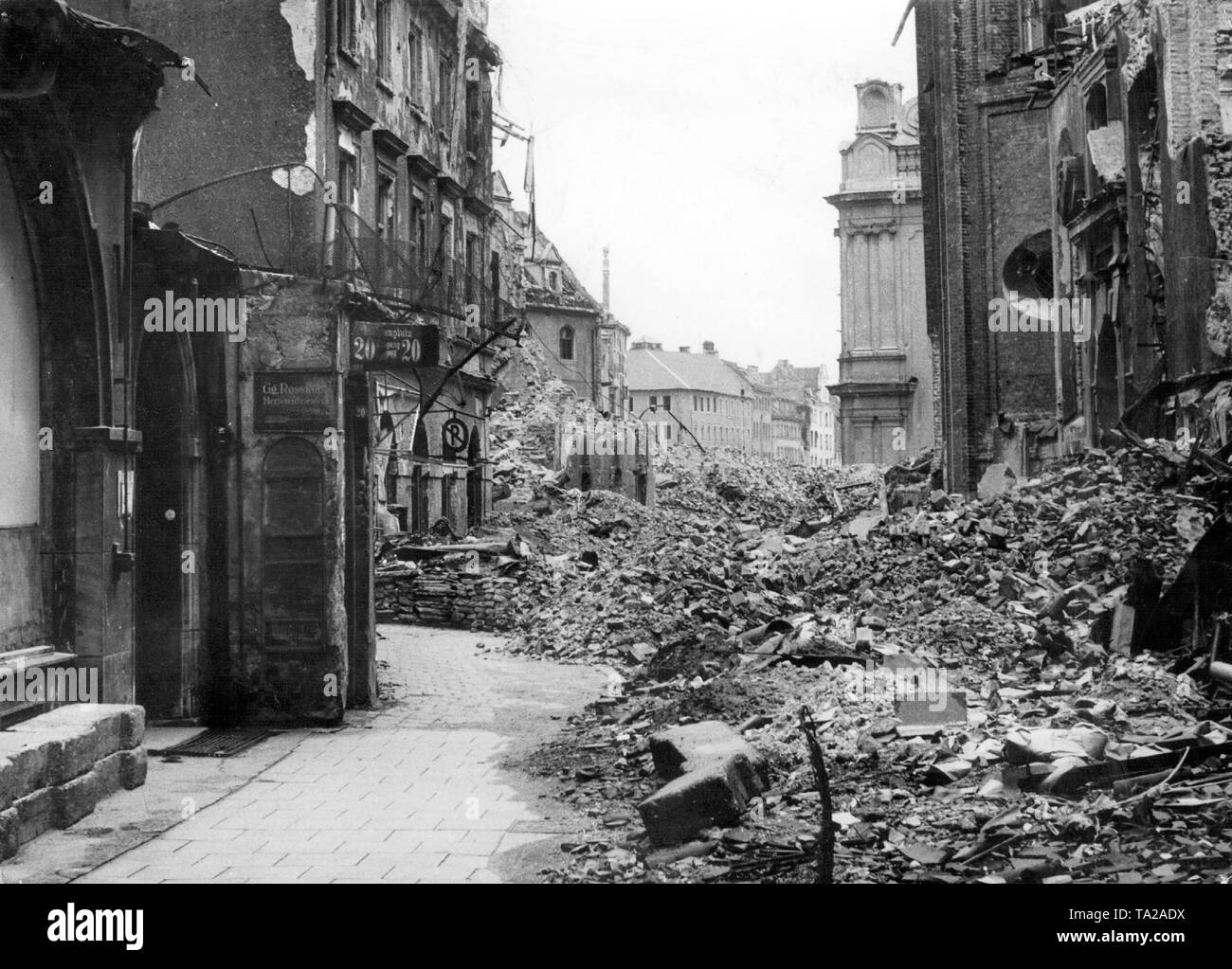 Street filled with rubble at the Petersbergl in Munich, Germany, 1945 Stock Photo