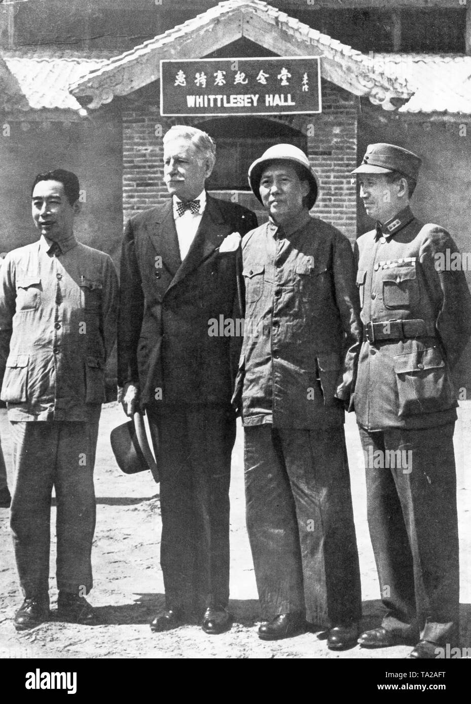 The American Ambassador Hurley at the Mao headquarters  in Yenan after the figts ended in China. From left to right: Mao's closest colleague Chou en Lai, American Ambassador Patrick Hurley, Mao Zedong and Leador of the Chinese National Party Chiang Ching Stock Photo