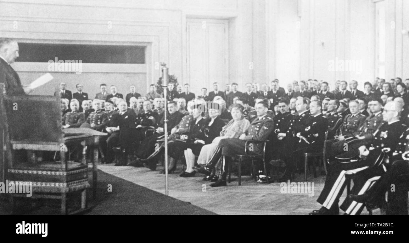 By Hitler's command, the Higher Regional Court of Prague was established in the Protectorate of Bohemia and Moravia. President of the Higher Regional Court Dr. Buerkle (2nd from the right) and Attorney General Gabriel (right) are being inaugurated. Reich Protector Konstantin von Neurath (left) gives a speech on the occasion of the inauguration. Stock Photo