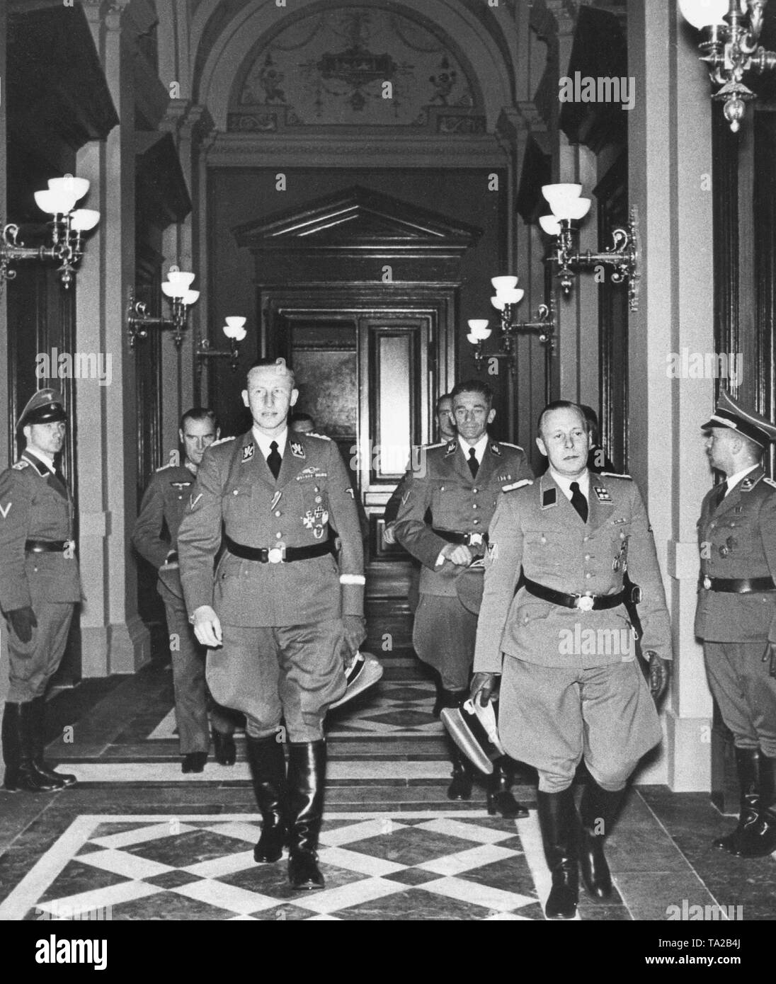 Reinhard Heydrich (front left), General of Police, arrives for a state ceremony at the Rudolfinum in Prague. Rear right, Karl Hermann Frank. Stock Photo