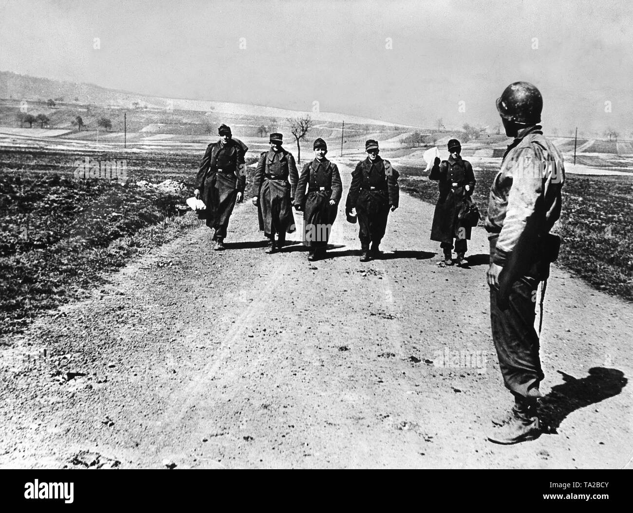 Soldiers of the Wehrmacht surrender to the American 36th Infantry Division, 1945 Stock Photo