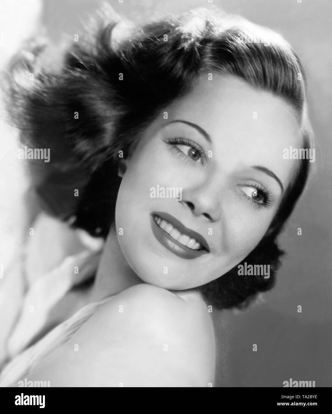 Portrait of a woman from the 1930s. She has bob length hair. Undated photo. Stock Photo