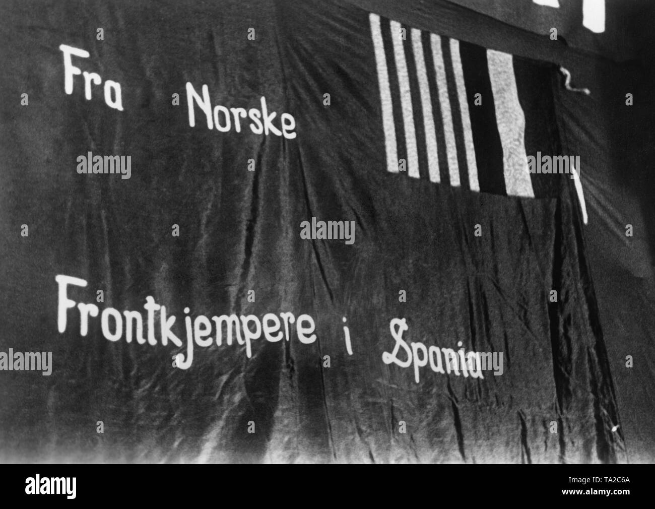 Photo of a flag of Norwegian volunteers of the International Brigades in the Spanish Civil War, 1937-1939. The banner says: "As a front fighter in Spain from Norway". Stock Photo