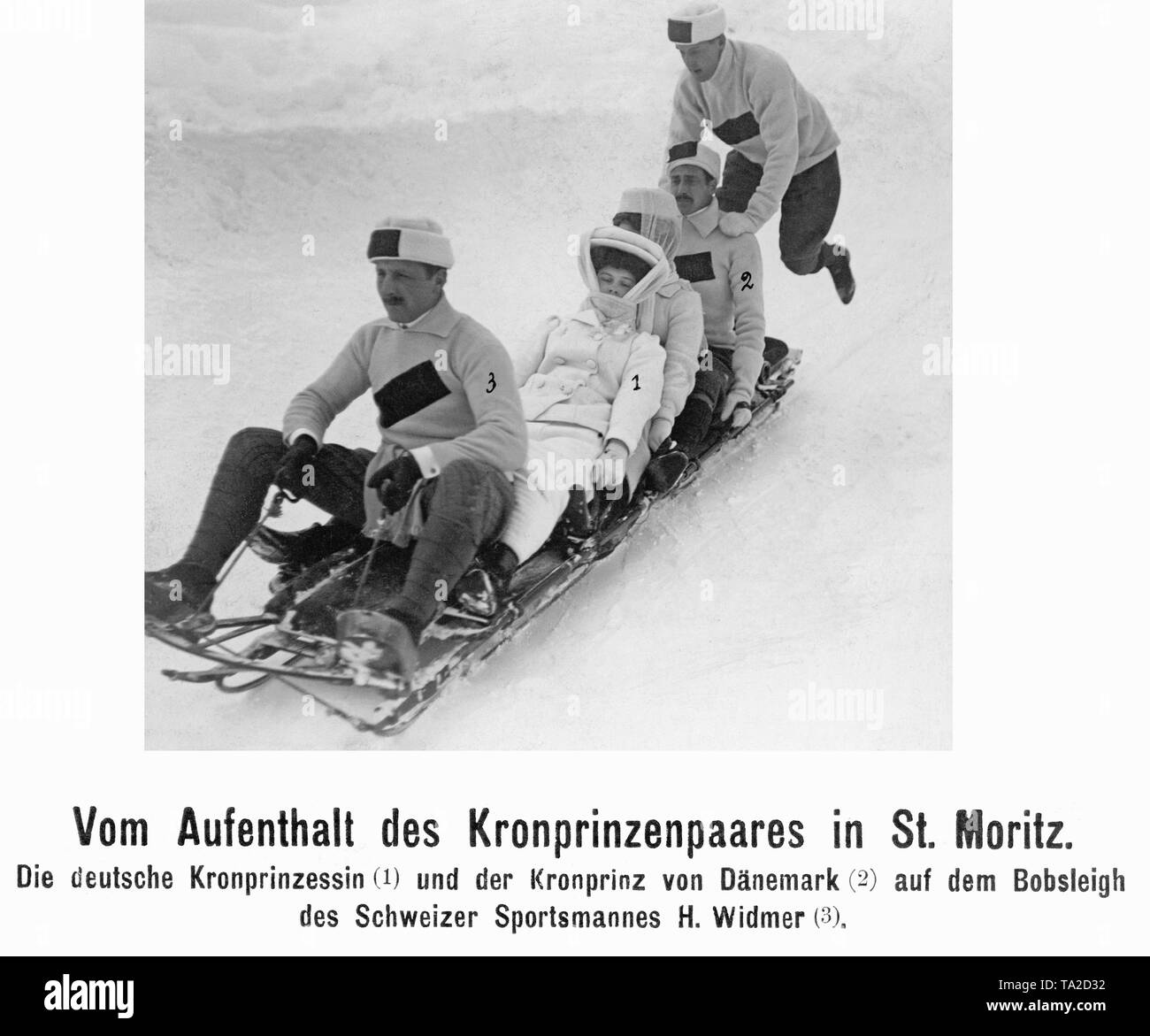 Crown Princess Cecilie, b. Duchess of Mecklenburg, bobsleighing with her family. From left: Mr. Widmer (Swiss athlete), Crown Princess Cecilie, her sister Crown Princess Alexandrine of Denmark (nee Duchess of Mecklenburg) with her husband Crown Prince Christian of Denmark. Stock Photo
