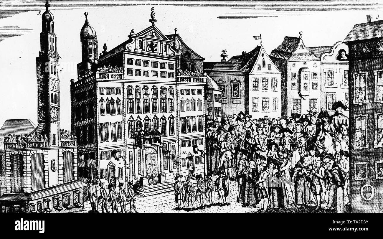 Public execution at the Augsburg Town Hall Square in 1790. On the right the three offenders accompanied by the priest Stock Photo