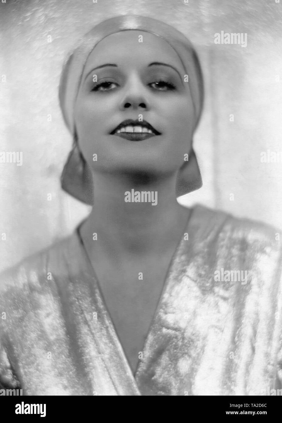 Woman portrait with headgear (presumably) from the 1930s. Undated photo. Stock Photo