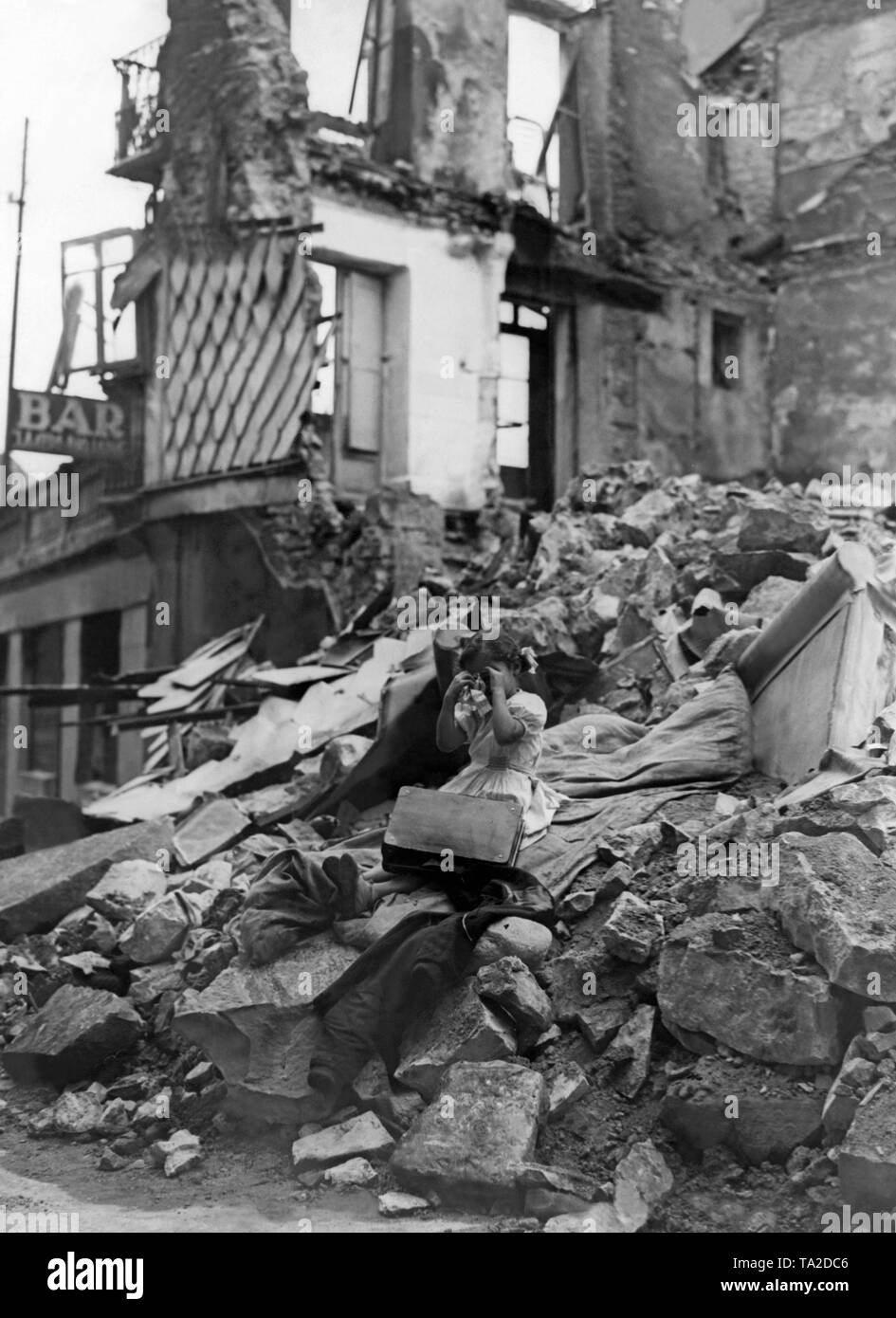 Photo of a crying child after a bombardment of the Basque border town (to France) Irun in the summer of 1936. The child lost his parents during the bomb attack. The house of the family was completely destroyed. Stock Photo
