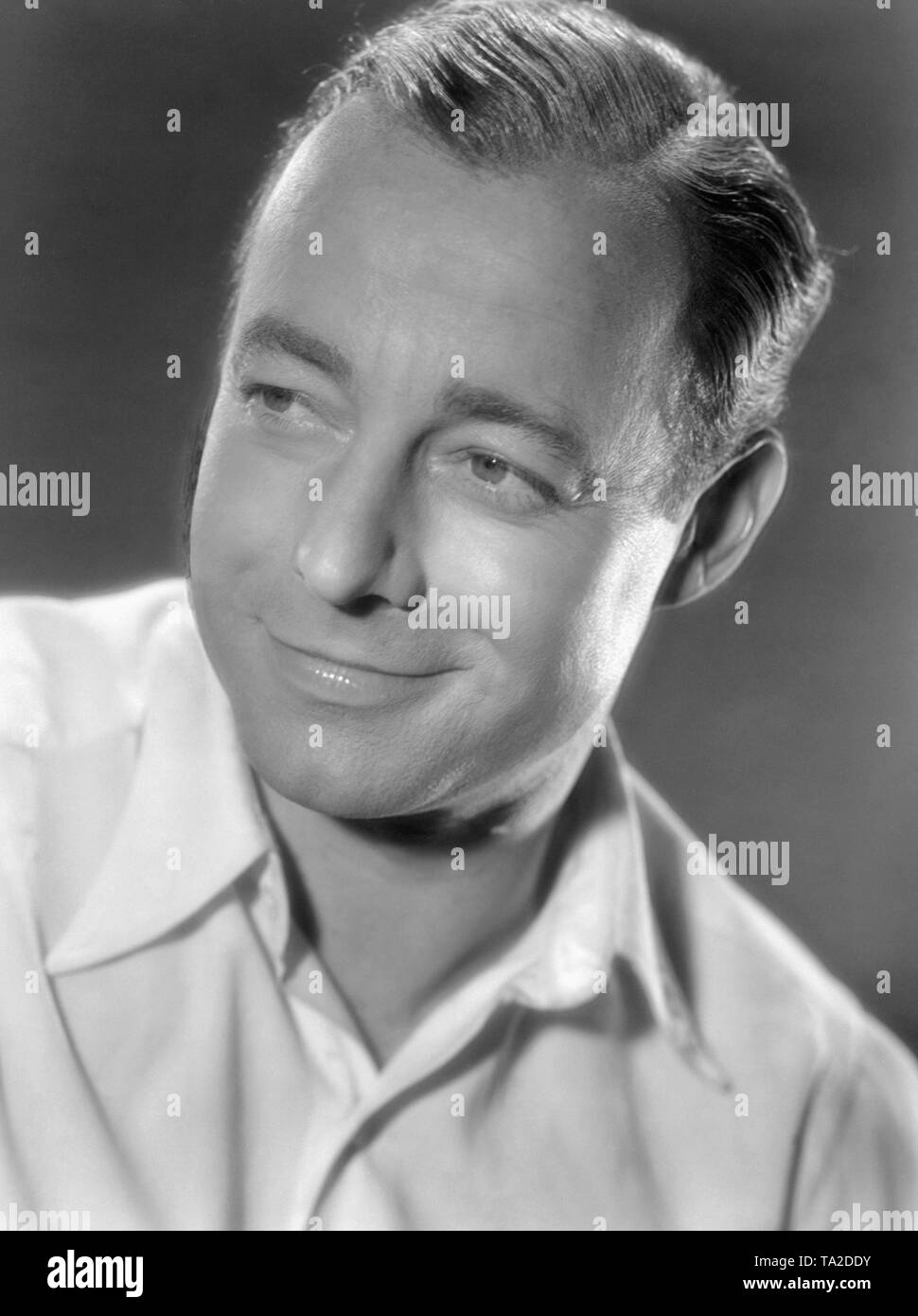 Portrait of the actor Heinz Ruehmann from the film comedy 'Hurrah! I'm a Papa ' In this film by Kurt Hoffmann Heinz Ruehmann plays an eternal student who unexpectedly becomes a father. Stock Photo