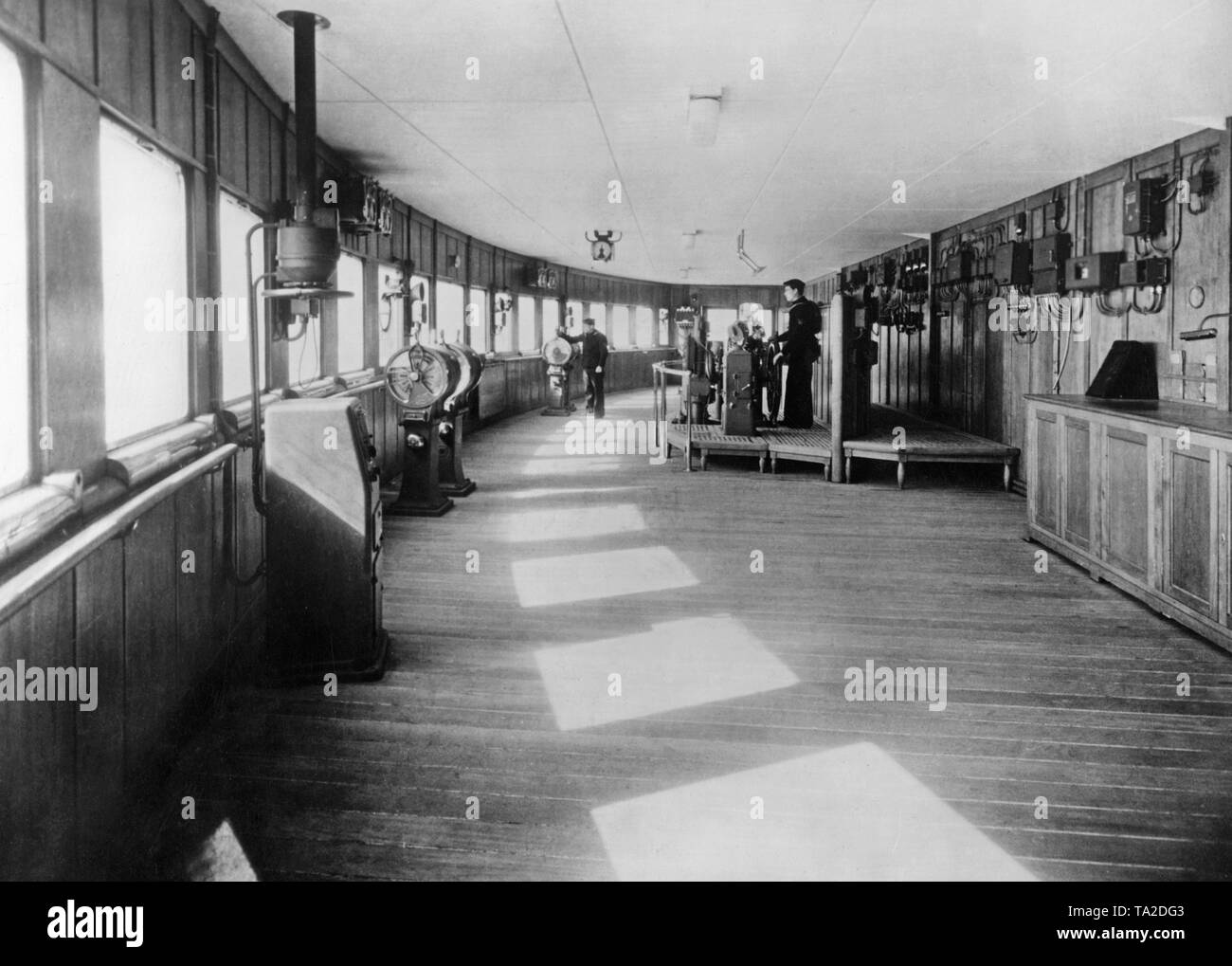 The command bridge aboard the 'Normandie' with control station and electric engine telegraph. Stock Photo
