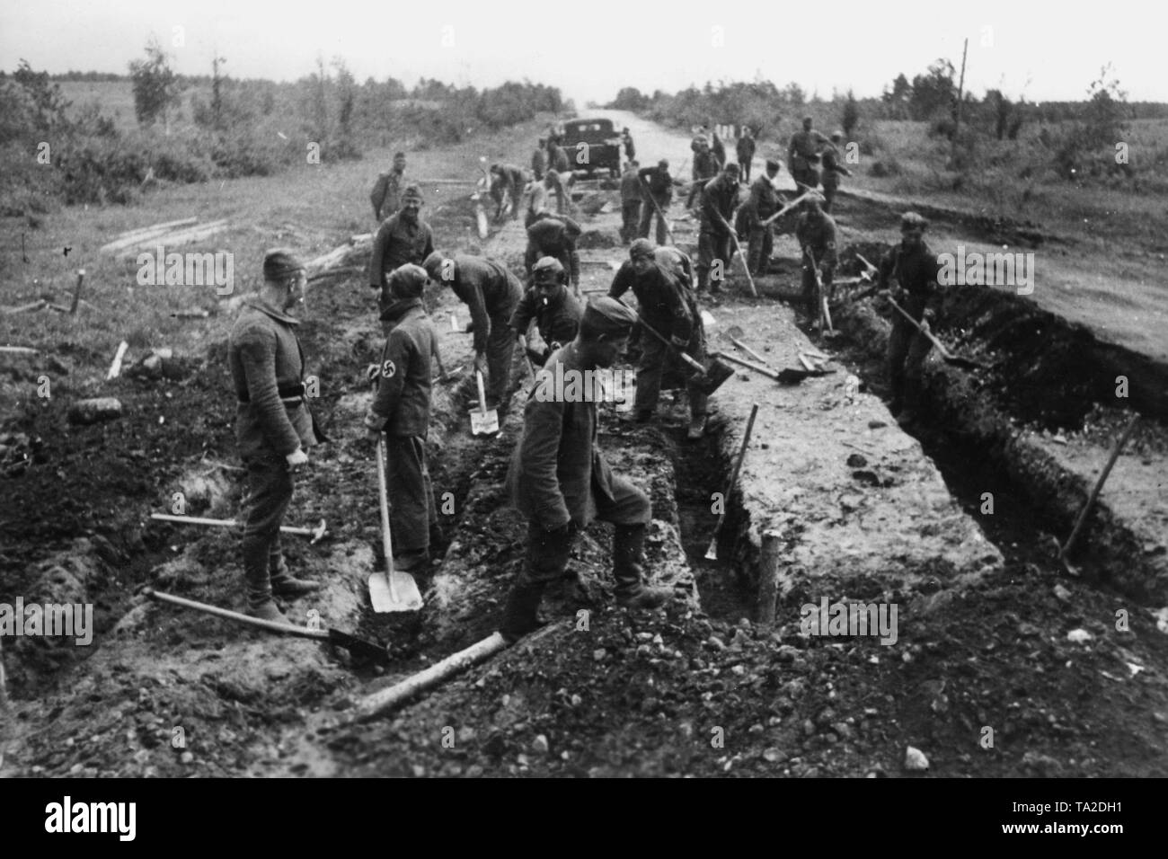 Workers of the Todt Organization are buliding passable roads for reinforcements to the Eastern Front in the Soviet Union. War reporter: Schneider. Stock Photo