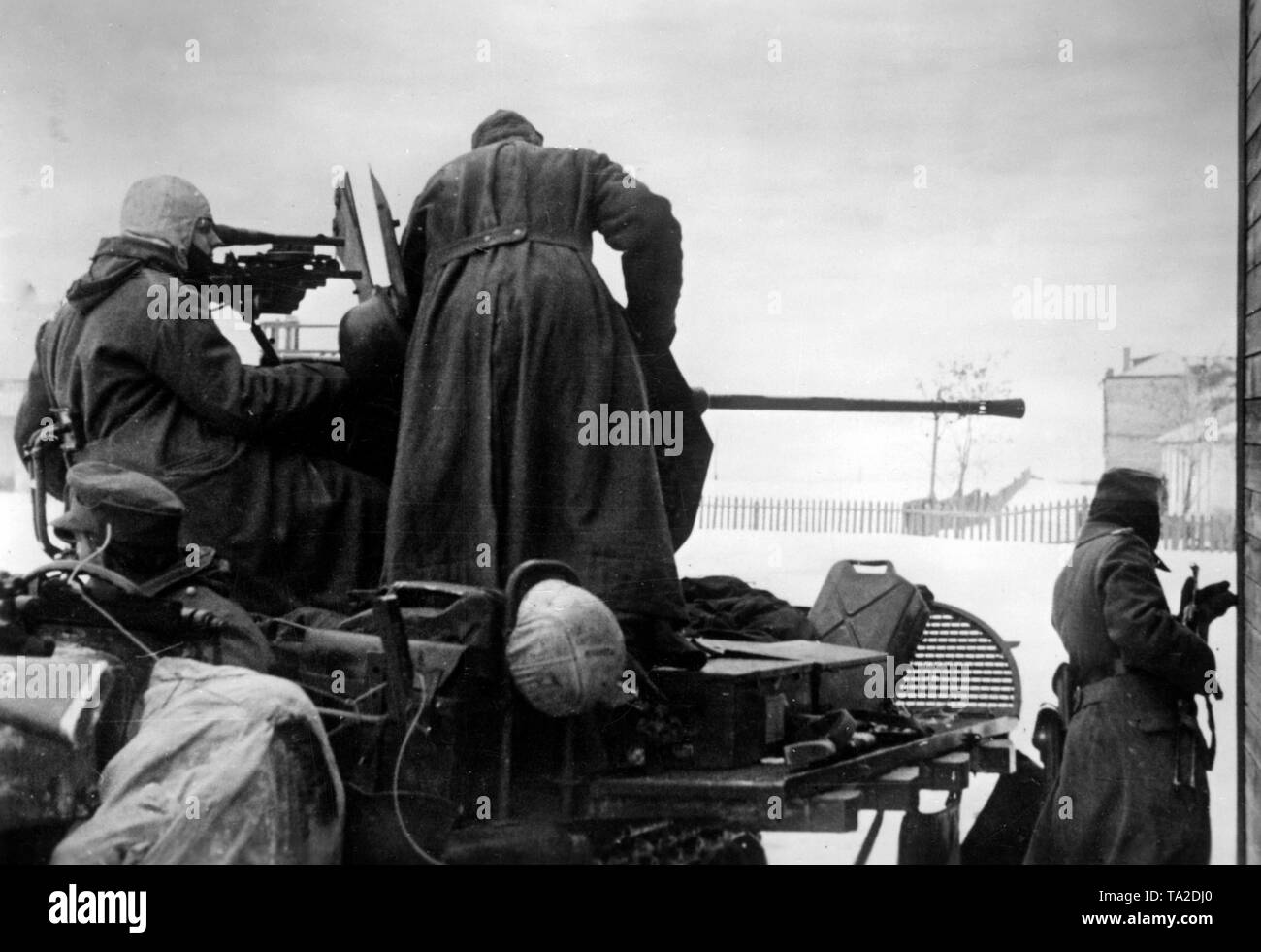 German soldiers are fighting with an Sd.Kfz. 10/ near a coal mine at the Don Bend. A 2-cm Flak 38 is placed onto this special motorized vehicle, in order to eliminate enemy tanks in ground combat. Photo of the Propaganda Company (PK): war correspondent Kripgans. Stock Photo