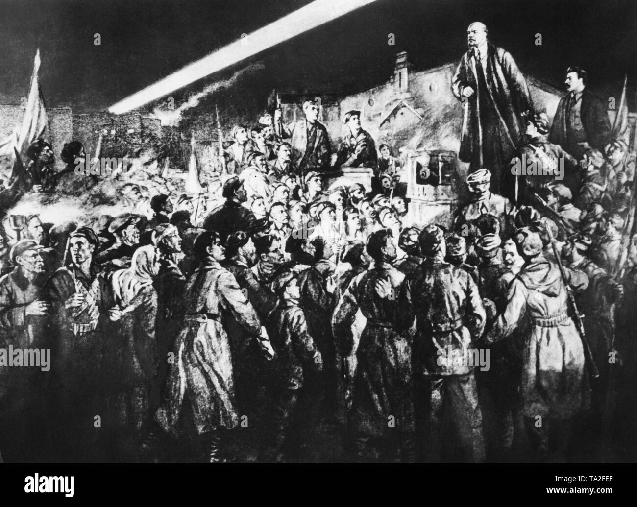 On his return from exile in Finland, Vladimir Ilyich Lenin gives a speech at the railway station in St. Petersburg the evening before the October Revolution. The artist added the figure of Josef Stalin to Lenin's right side. Stock Photo