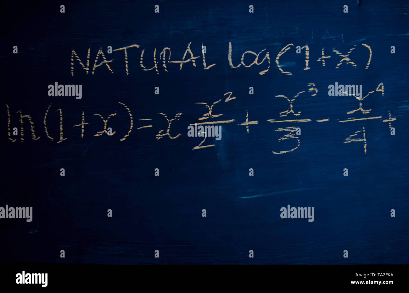 Close up math formulas written on a blackboard. Education concept Stock Photo