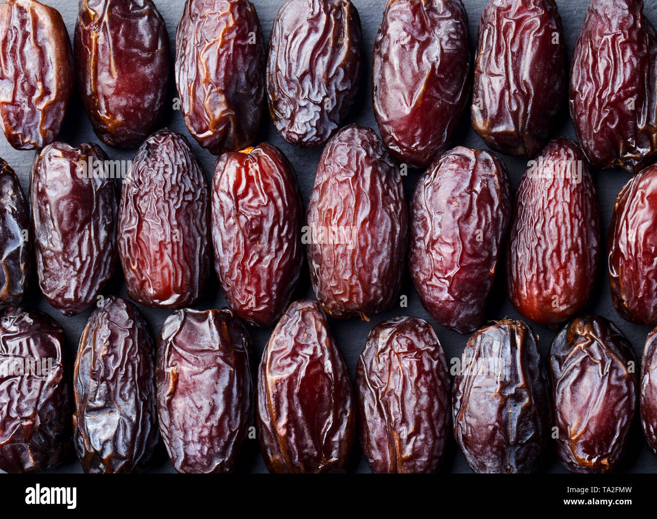 Fresh Medjool Dates background. Healthy organic product. Top view Stock  Photo - Alamy